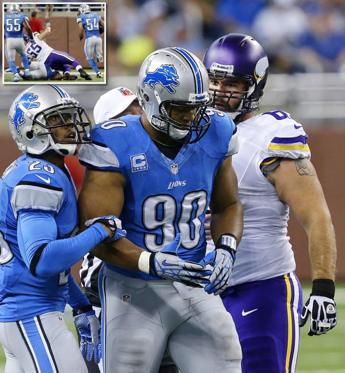 2013-0908-Ndamukong-Suh-John-Sullivan.jpg